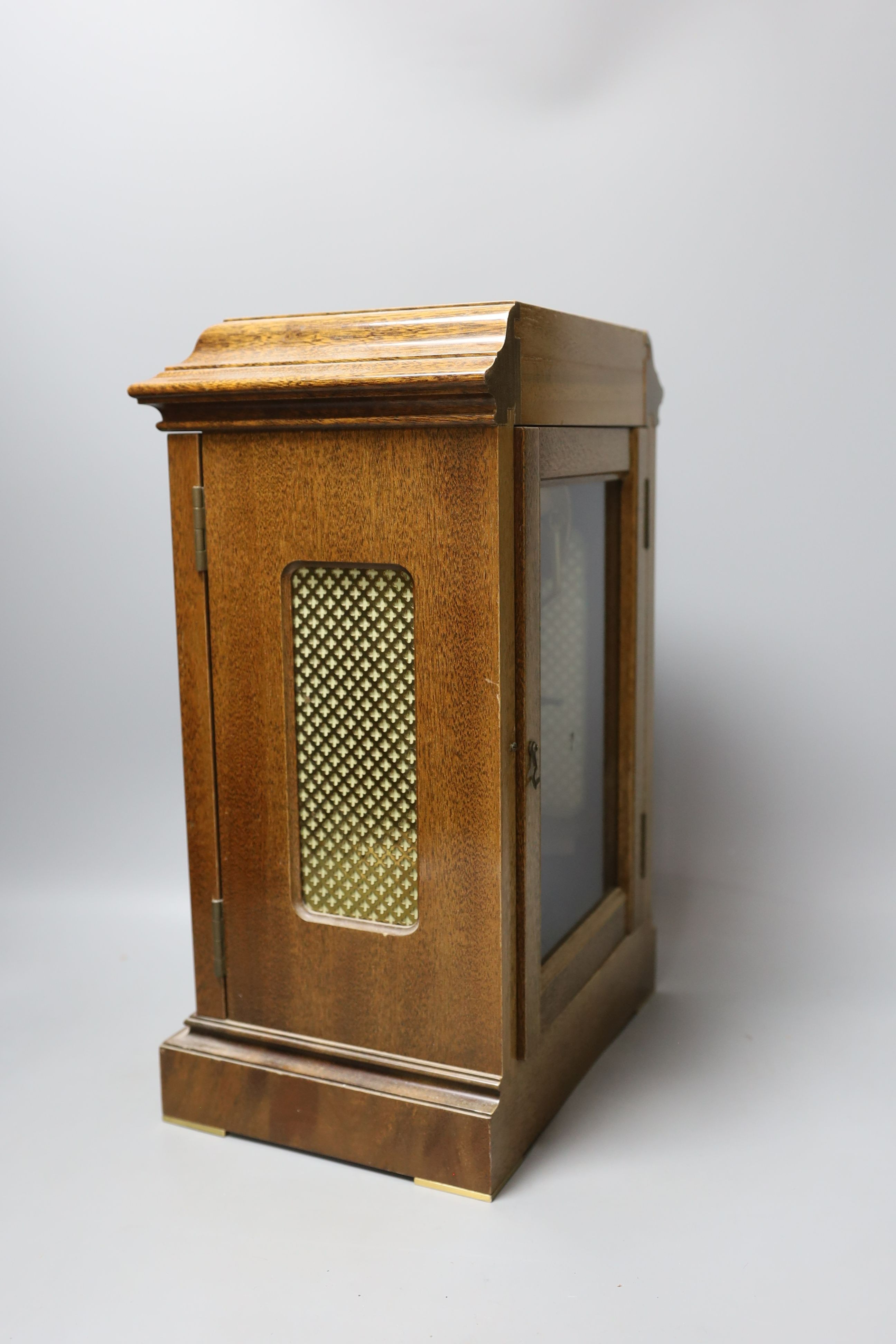 A mahogany chiming mantel clock